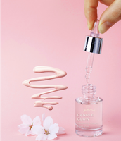 "Candle Glow" Highlighter Glistening Serum in Pearly Pink 