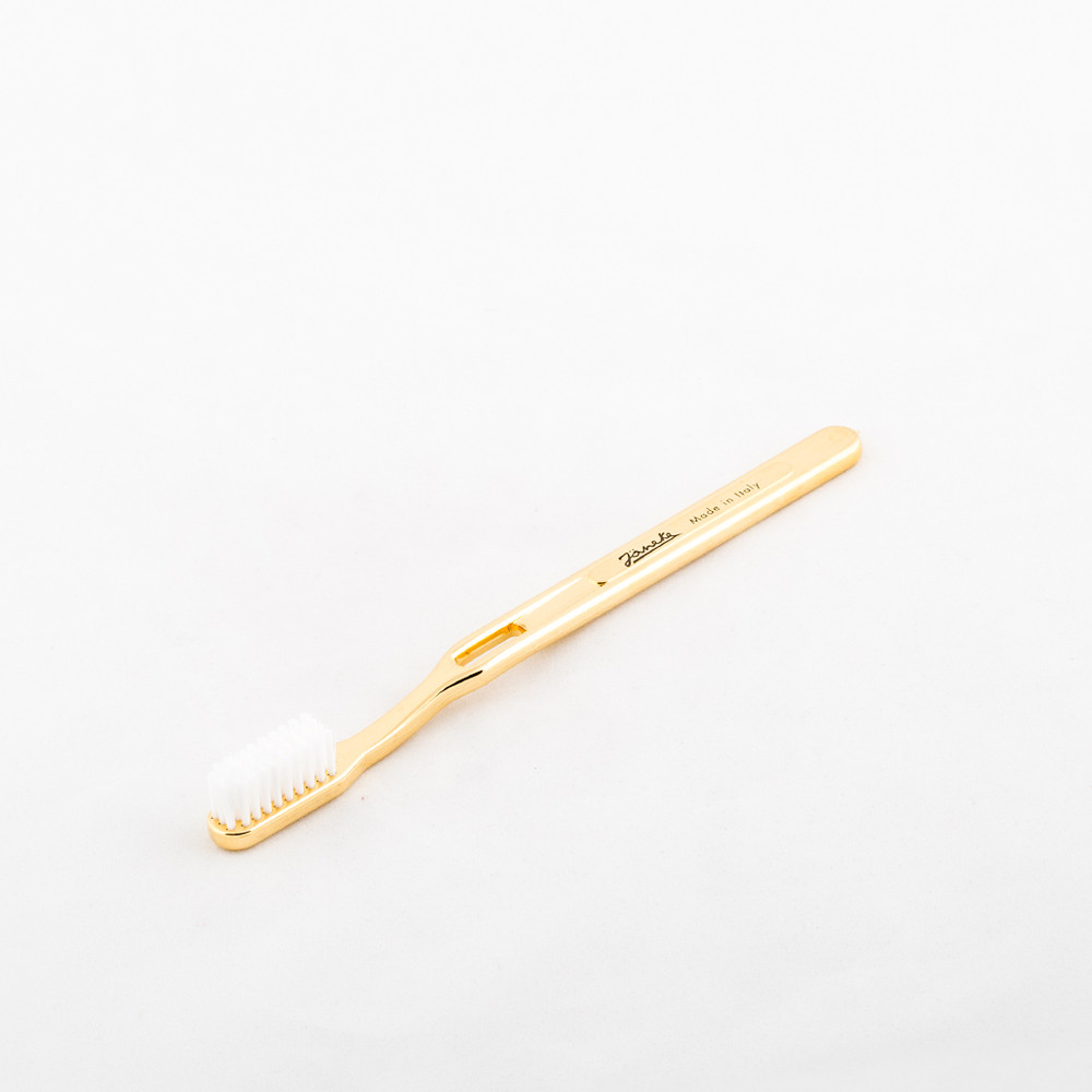 gold toothbrush