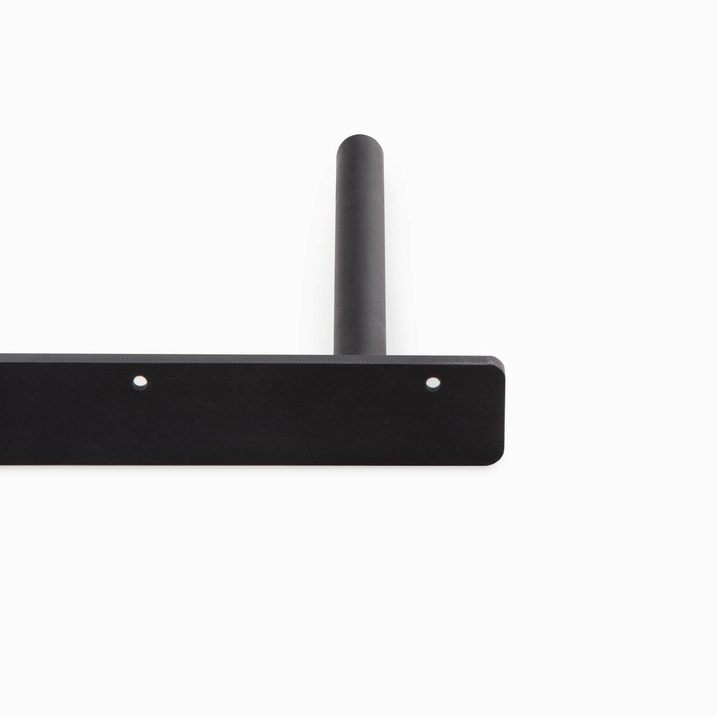 Detailed view of solid floating shelf bracket constructed with 10 inch solid rods