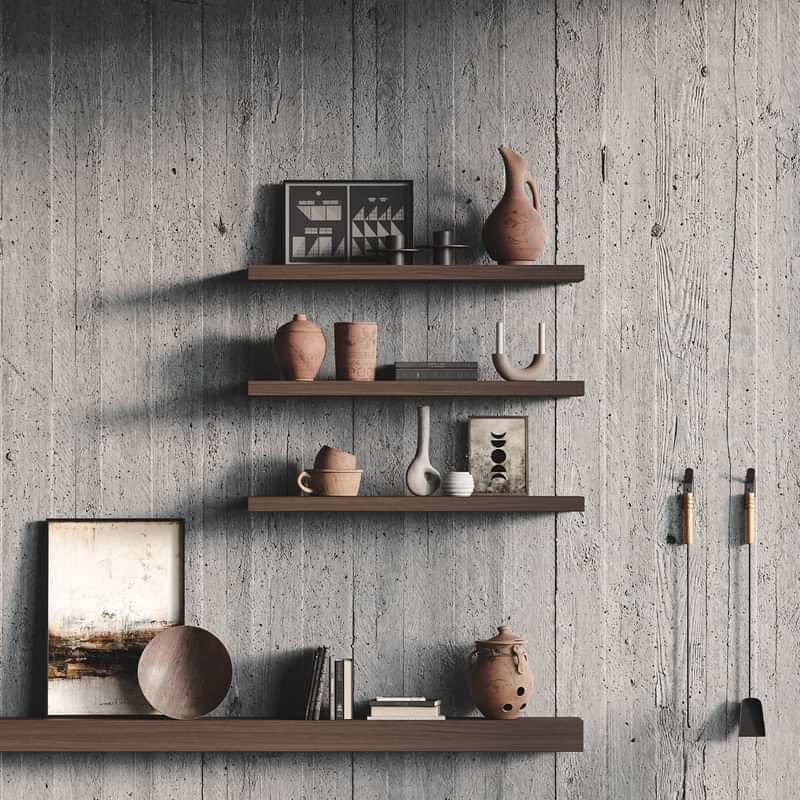 Aksel Walnut Floating Shelf brings warm wood tones to a pottery display