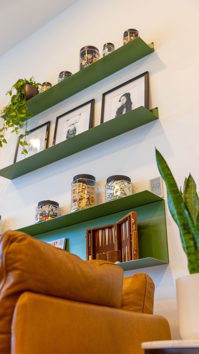 Double Benders and Benders pair above the couch to hold game pieces