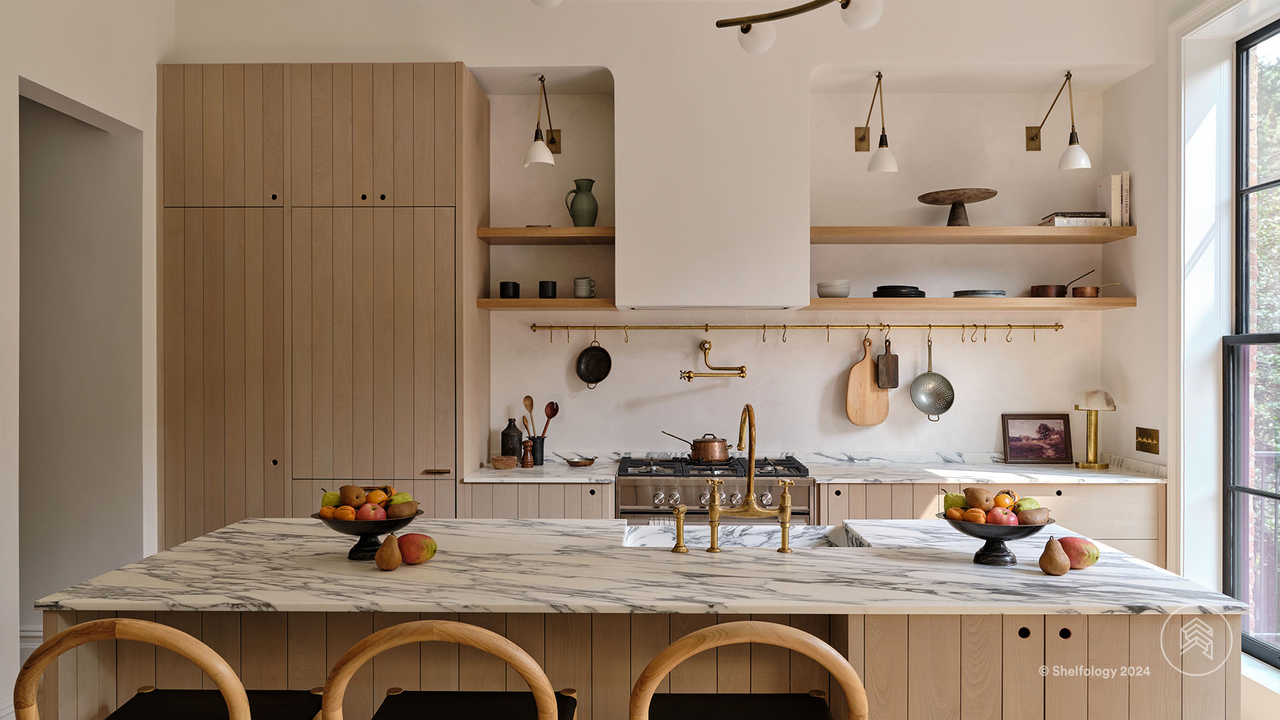 A warm kitchen with open shelving emerges from the old floor plan.