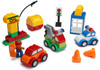 Play Build Car Creator Building Blocks Set  52 Pieces  Includes Mechanic Minifigure, Garage Accessories & Base Parts to Create a Police Car, Oil Rig, Tow Truck & More  Compatible with DUPLO