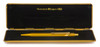 Caran D'Ache 849 Goldbar  Ballpoint Pen - Gold faceted w GT (Excellent + in Box, Works Well)