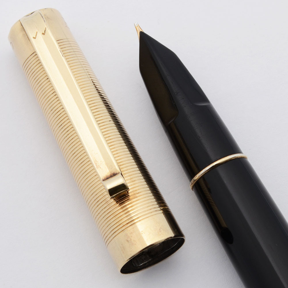 Eversharp Fifth Avenue Fountain Pen (1950s) - Full Size, Black Barrel, Gold Cap, Lever Filler, Medium Nib (Excellent, Restored)
