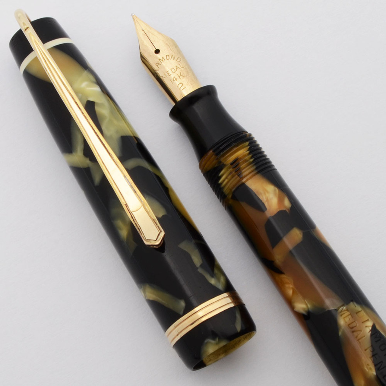 Diamond Medal Comrade Fountain Pen (1930s) -- Long Slender, Black & Pearl, Lever Filler, 14k Fine Nib (Excellent, Restored)