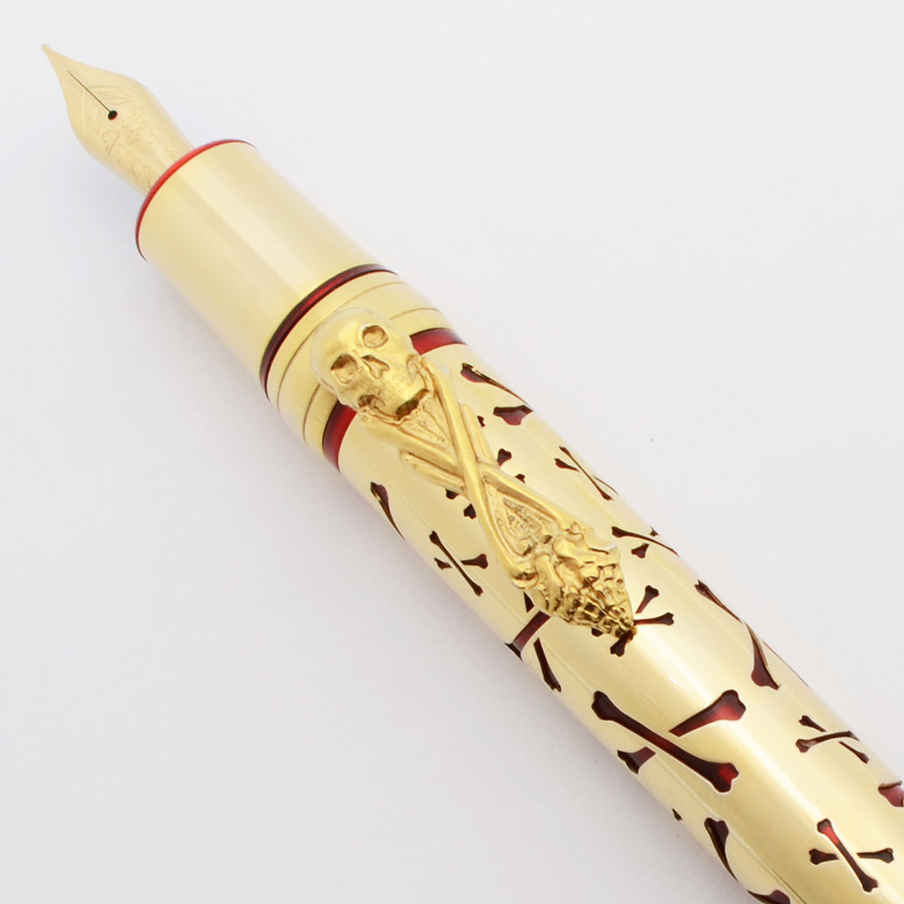 Stipula DaVinci Caribbean LE Fountain Pen (2000s) - Gold Plated Crossbones Overlay on Red Celluloid, Safety Pen, 14k #5 Fine Nib (Excellent + , Works Well)