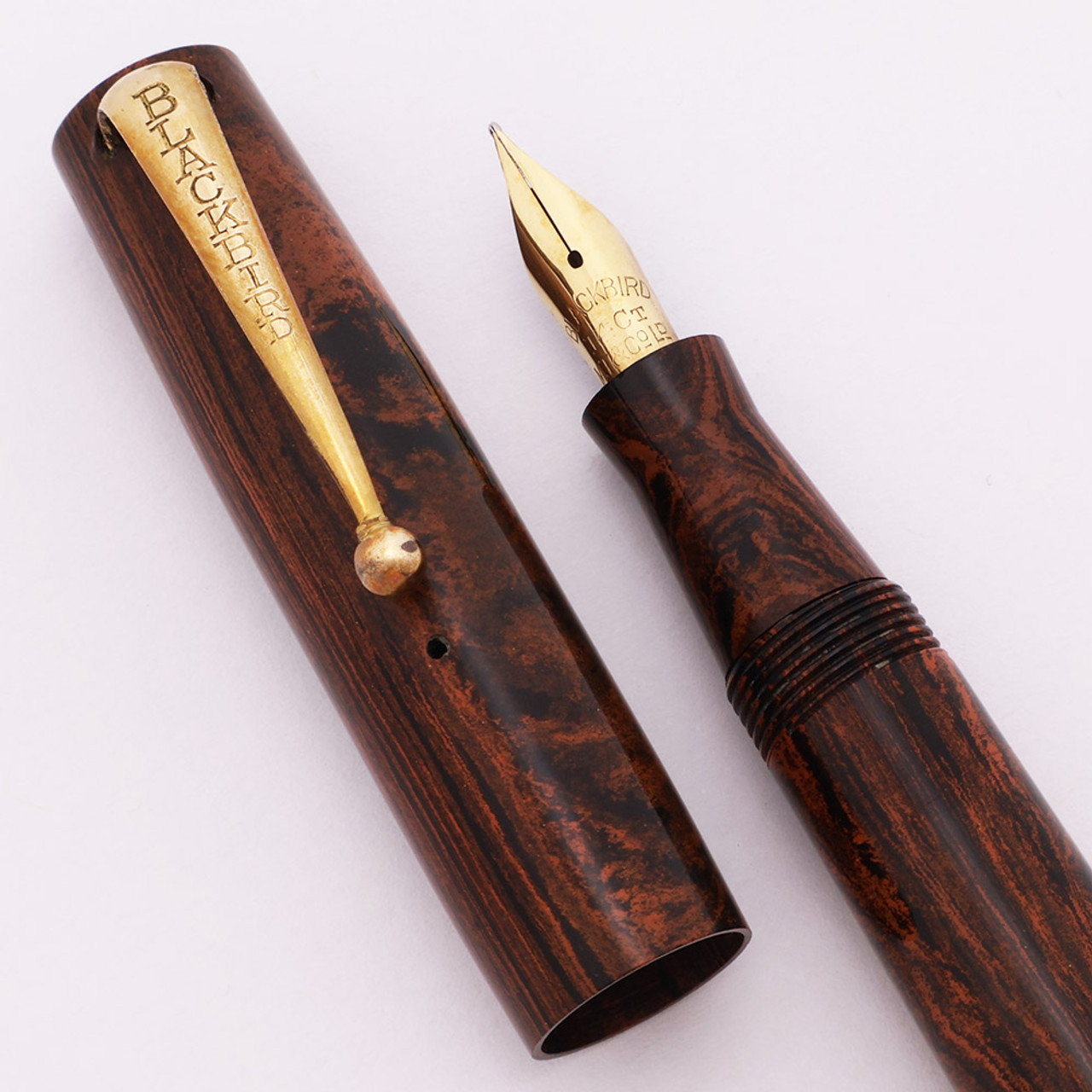 Mabie Todd Blackbird (England) Self-Filling Fountain Pen - Red Mottled Hard Rubber, Fine Flexible Nib (Excellent +, Restored)