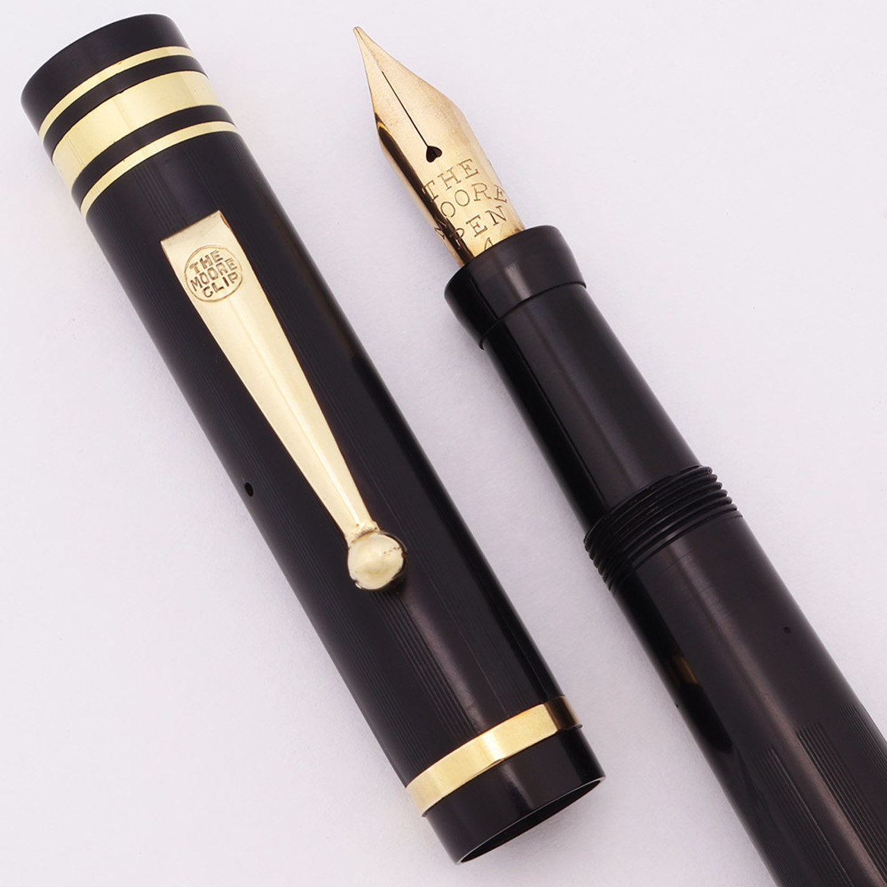 Moore L-94 Oversize Fountain Pen (1920s) - Black Lined Hard Rubber, Lever Filler, Fine Semi-Flex Moore Pen #4 Nib (Excellent +, Restored) Moore L-94 Oversize Fountain Pen (1920s) - Black Lined Hard Rubber, Lever Filler, Fine Semi-Flex Moore Pen #4 Nib (Excellent +, Restored)