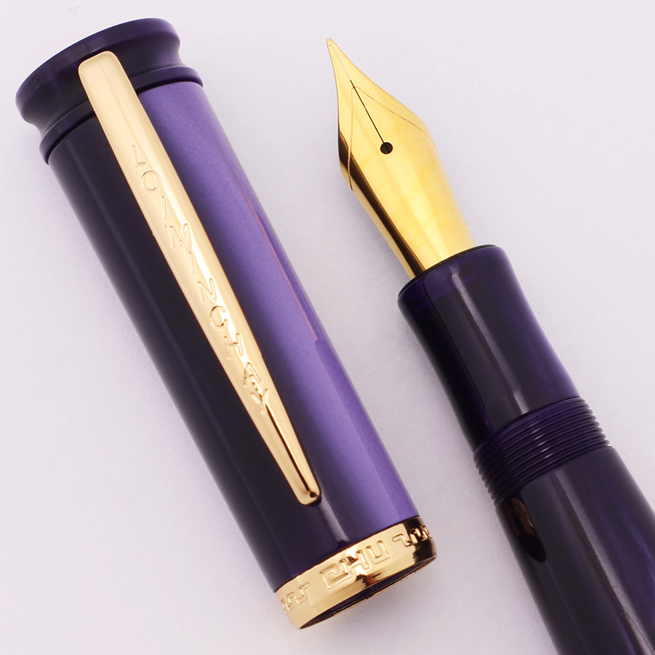 Loiminchay Mini Qian Long Fountain Pen (2008) - Purple, Gold Plated Trim, Steel Nibs (New Old Stock) Loiminchay Mini Qian Long Fountain Pen (2008) - Purple, Gold Plated Trim, Steel Nibs (New Old Stock)
