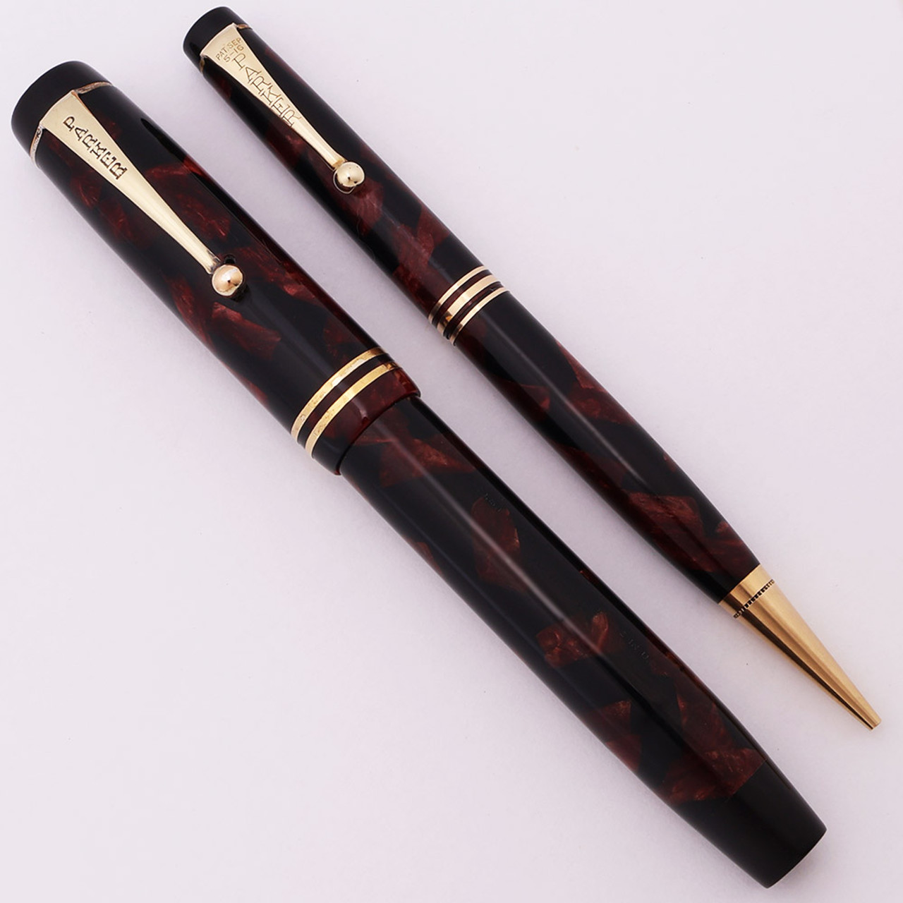 Parker Duofold Senior Streamline Fountain Pen and Pencil Set (1930s) -  Burgundy Marble, Button Filler, Fine Duofold Nib (Excellent, Restored) Parker Duofold Senior Streamline Fountain Pen and Pencil Set (1930s) -  Burgundy Marble, Button Filler, Fine Duofold Nib (Excellent, Restored)