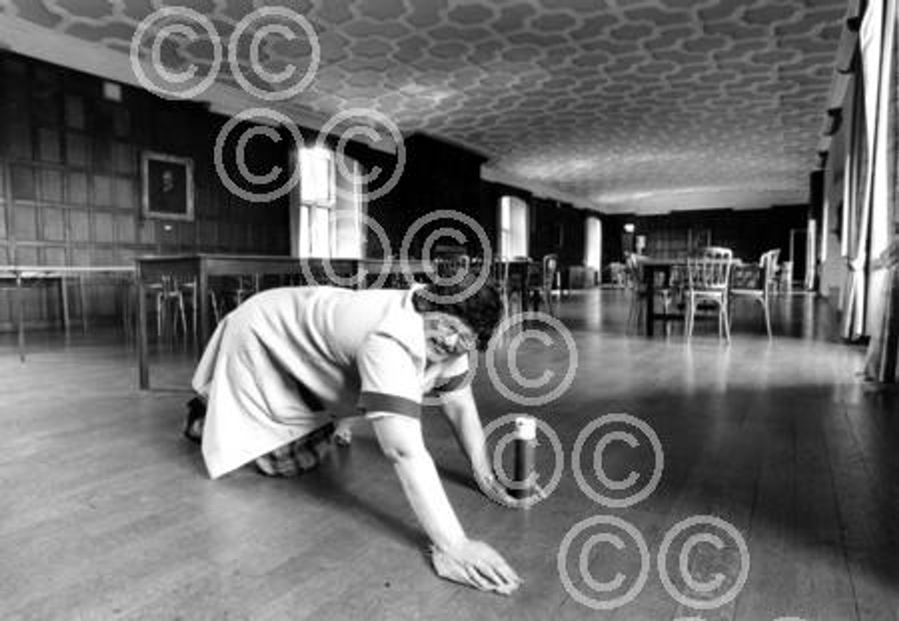 28031184 Argus Looking Back Series Yesterdays LB 4708 Bernadette Burton cleaning the dining room floor at Herstmonceux castle in 1988