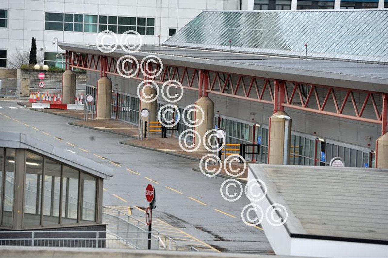 39914289 With the Bus station closed at Bradford Interchange staff help passsengers locate the correct road where the bus will stop. MS2311