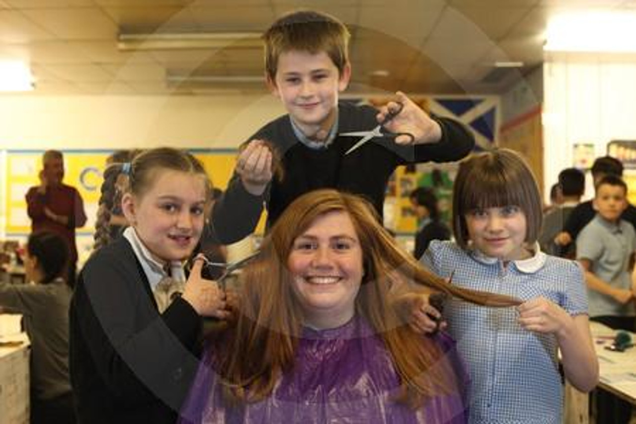 20998691 Children at Oakgrove Primary SChool are being trained in Hairdressing ahead of a behaviour Festival at the Arches this weekend. Louise Brodie