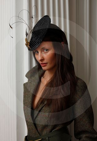 16572821-Model Emma Giannini wearing a Harris Tweed coat and straw