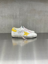 Golden Goose - Super-Star uomo in pelle e rete bianca con stella e talloncino gialli
