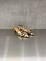 Chantal - Chanel in pelle laminata platino con fiocco