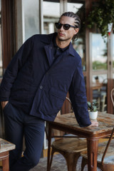 Amaranto - Giacca impermeabile blu con trapuntino interno bronzo