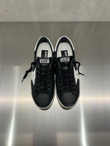 Golden Goose - Super-Star uomo in pelle nera con stella e talloncino in pelle bianca