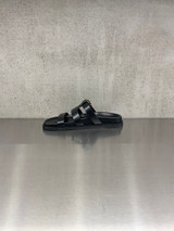 Bibi Lou - Sandalo basso in pelle nera con fibbia oro