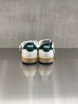 4B12 - Sneakers PLAY.NEW - U1002 in pelle bianca con talloncino verde e logo giallo