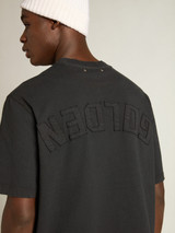 Golden Goose - T-shirt di colore nero lavato con logo reverse sul retro - Jersey Capsule