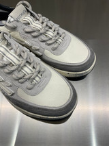 Premiata - Sneakers Nous in pelle bianca e grigia