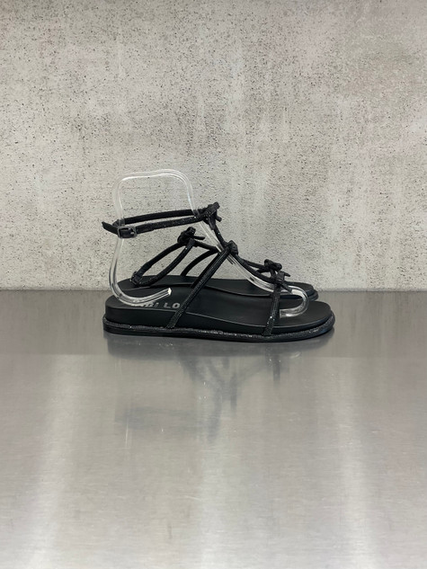 Bibi Lou - Sandalo basso in pelle con fiocchi e  micro strass nero