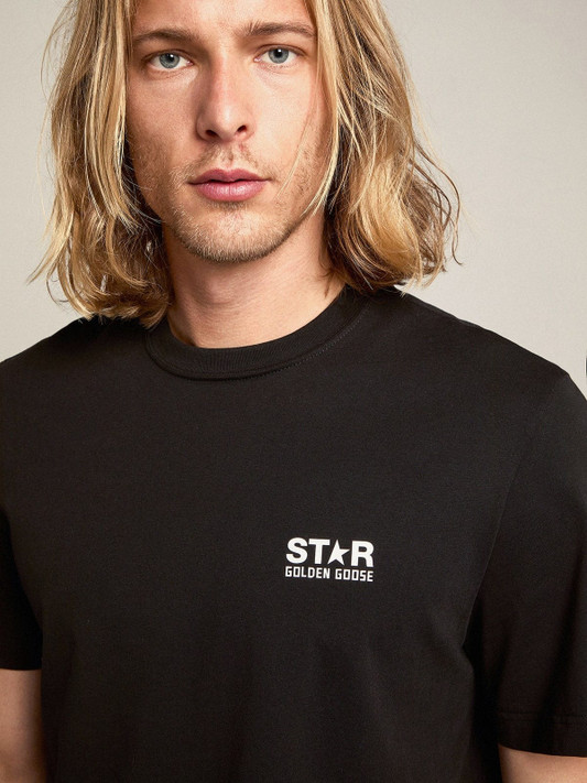 Golden Goose - T-shirt nera Collezione Star con logo e stella bianca a contrasto Golden Goose - T-shirt nera Collezione Star con logo e stella bianca a contrasto