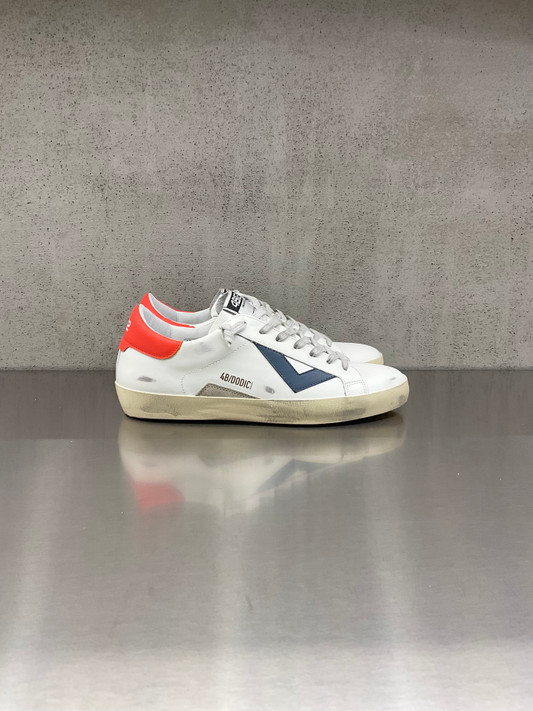 4B12 - Sneakers SUPRIME - U201 in pelle bianca e talloncino rosso