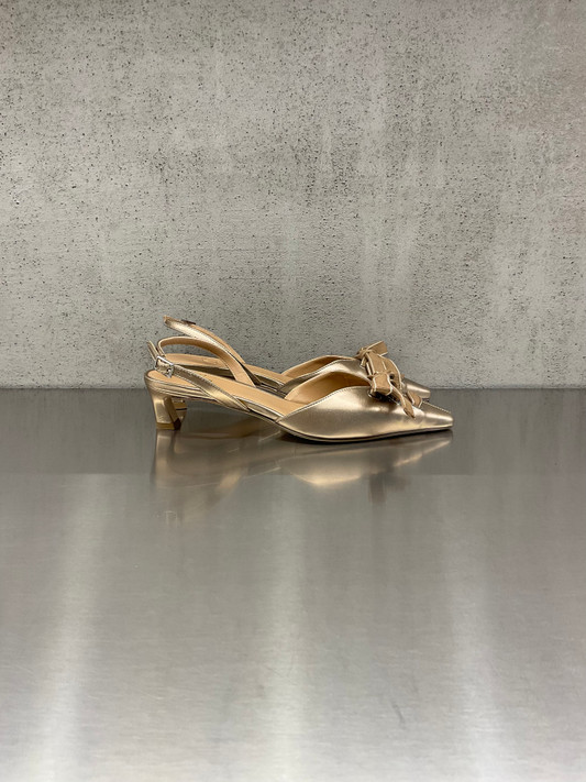 Chantal - Chanel in pelle laminata platino con fiocco