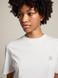 Golden Goose - T-shirt bianca Collezione Star con stella in glitter argento sul davanti