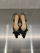Chantal - Chanel in pelle nera con fiocco
