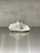 Golden Goose - Super-Star sabot donna in pelle bianca con stella glitterata argento e fodera in shearling