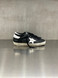 Golden Goose - Super-Star uomo in pelle nera con stella e talloncino in pelle bianca
