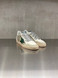 Golden Goose - Ball Star uomo in pelle e rete bianca con stella verde e talloncino argento