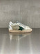 Golden Goose - Ball Star uomo in pelle e rete bianca con stella verde e talloncino argento
