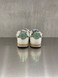 4B12 - Sneakers PLAY.NEW - D2014 in pelle bianca con talloncino e logo verde glitterato