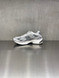 New Balance - U201011NGRI - Grigia con dettagli grigio scuri e suola bianca