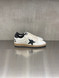 Golden Goose - Ball Star uomo in pelle bianca con stella e talloncino in pelle nera