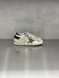 Golden Goose - Super-Star uomo in pelle ghiaccio con stella verde oliva e talloncino in suede nero