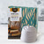 Gift box with a package of Brown Sugar Caramel Pound Cake Mix and 4 mini swirl pans.