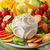 Key Lime Cheese Ball Mix prepared on a plate with fruit