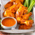 garlic parmesan wing sauce covered chicken wings