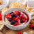 Champagne Baked Brie in a white bowl