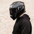 Rider wearing Simpson Mod Bandit gloss black modular motorcycle helmet
