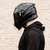 Simpson Mod Bandit gloss black helmet worn on motorcycle – full-face protection