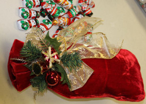 Red Christmas Velvet Bag filled with 1 Pound of Christmas Chocolate Red Christmas Velvet Bag filled with 1 Pound of Christmas Chocolate