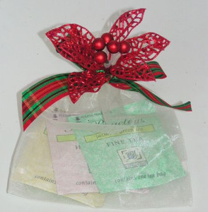 Fancy Herbal Tea Assortment in a bag wrapped w/Fancy Christmas Ornament Fancy Herbal Tea Assortment in a bag wrapped w/Fancy Christmas Ornament