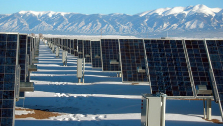 Solar system on the roof with snow in winter. Remove snow from